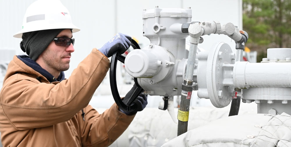 EGTS Employee Turning a Control Wheel